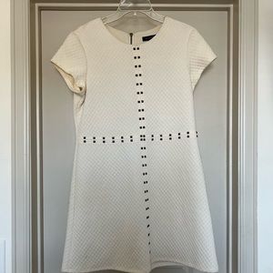 Cream dress with that flares alittle at the bottom